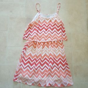 pink and white chevron patterned dress
